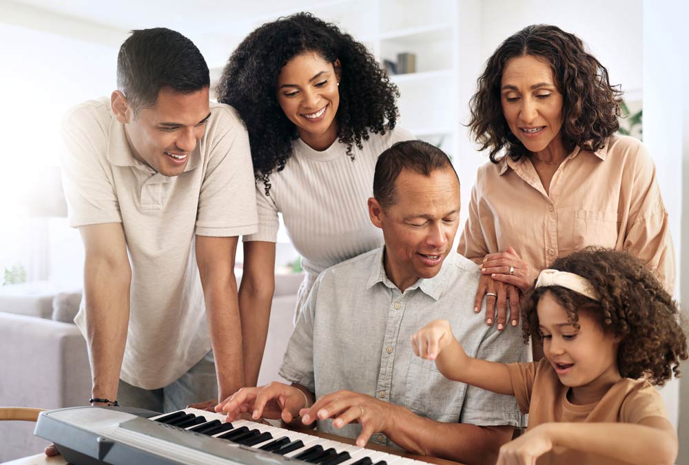 Family gathered around a piano, warm golden lighting, the joy of shared music